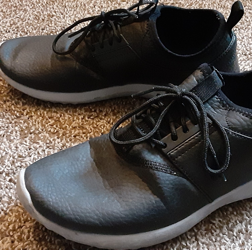 Black leather Nikes, women's size 7.5